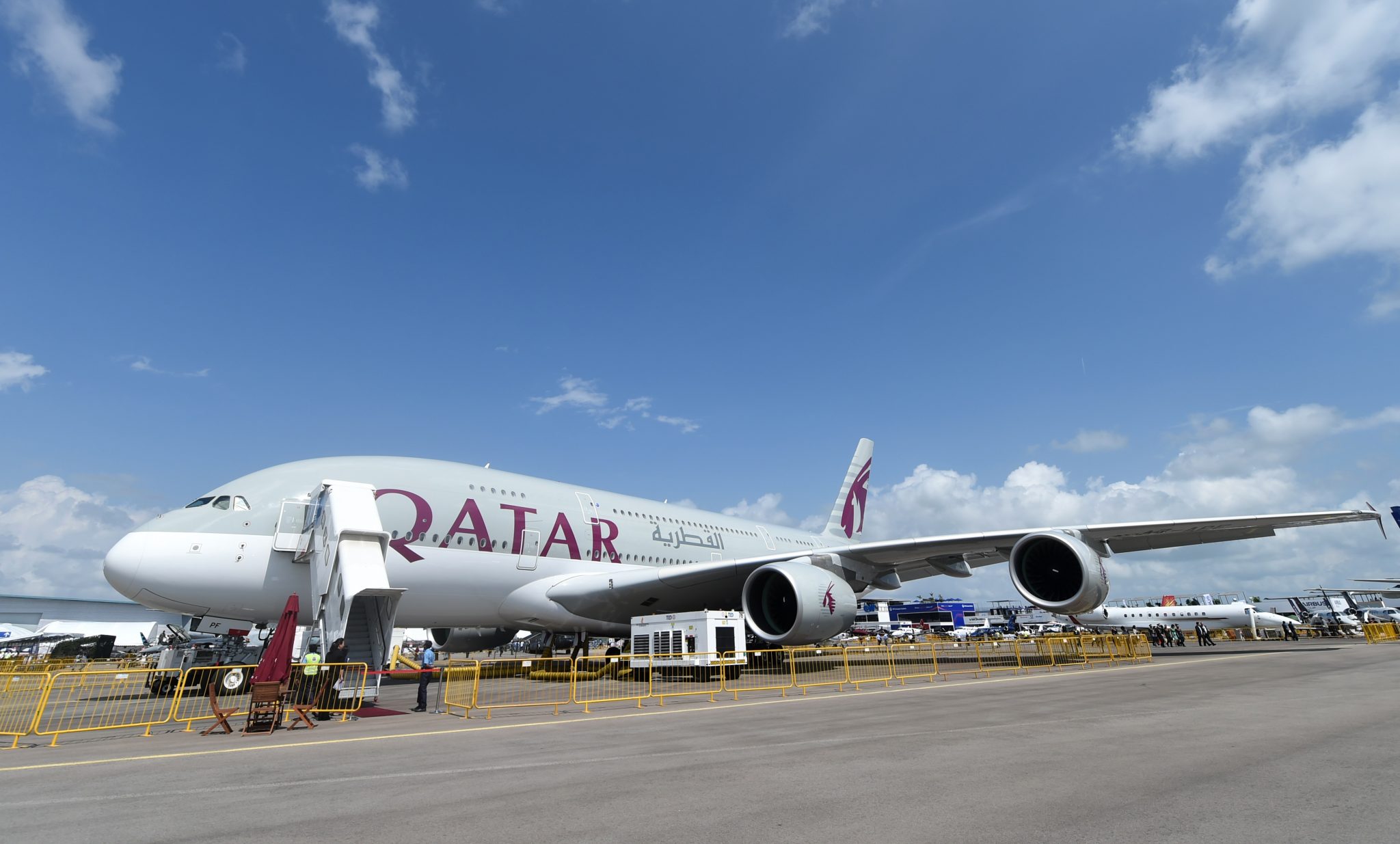 FILE PHOTO: A Qatar Airways Airbus A380 plane is seen at the static display during the Singapore Airshow at the Changi exhibition centre in Singapore on February 16, 2016. AFP PHOTO / ROSLAN RAHMAN / AFP PHOTO / ROSLAN RAHMAN