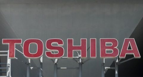 The Toshiba Corporation logo is seen at the company's headquarters in Tokyo on February 16, 2017. Shares in Toshiba fell 1.95 percent to 205.6 yen after losing 16 percent the previous two days as fears mount over massive losses from its US nuclear power business. / AFP PHOTO / KAZUHIRO NOGI