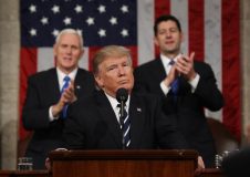 US President Donald J. Trump reacts after delivering his first address to a joint session of Congress from the floor of the House of Representatives in Washington, DC, USA, 28 February 2017. / AFP PHOTO / POOL / JIM LO SCALZO
