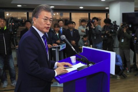 South Korea's presidential candidate Moon Jae-In from the Democratic Party speaks during a press conference in Seoul on March 12, 2017. South Korea must hold a presidential election within 60 days and Moon, a former Democratic Party leader narrowly beaten by Park Geun-Hye in 2012, has long been leading the polls. / AFP PHOTO / YONHAP / str / - South Korea OUT / REPUBLIC OF KOREA OUT NO ARCHIVES RESTRICTED TO SUBSCRIPTION USE