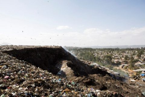 A photo taken on March 12, 2017 shows a view of the main landfill of Addis Ababa on the outskirts of the city, after a landslide at the dump left at least 30 people dead. At least 30 people died and dozens more were hurt in a giant landslide at Ethiopia's largest rubbish dump outside Addis Ababa, a tragedy squatters living there blamed on a biogas plant being built nearby. The landslide late on March 11 saw dozens of homes of people living in the dump levelled after a part of the largest pile of rubbish at the Koshe landfill collapsed, an AFP journalist said.  / AFP PHOTO / ZACHARIAS ABUBEKER
