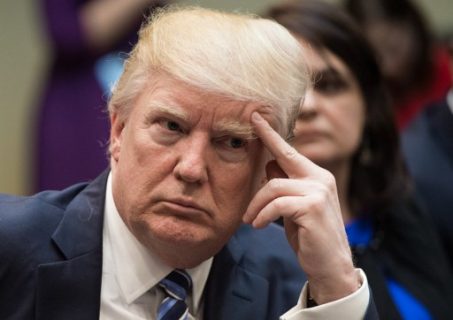 US President Donald Trump attends a meeting about healthcare in the Roosevelt Room at the White House in Washington, DC, on March 13, 2017. / AFP PHOTO / NICHOLAS KAMM