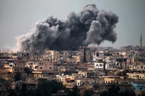 Smoke billows following reported air strikes on a rebel-held area in the southern city of Daraa, on March 16, 2017. Daraa province, the cradle of the 2011 uprising against President Bashar al-Assad's regime, is mostly held by the rebels but pro-government forces and Islamic State are also present.  / AFP PHOTO / MOHAMAD ABAZEED
