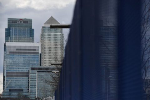 The Canary Wharf financial district under cloudy skies in Canary Wharf in east London on March 21, 2017. British annual inflation jumped in February to the highest level in almost three and a half years, driven by increasing fuel costs, data showed Tuesday. / AFP PHOTO / BEN STANSALL