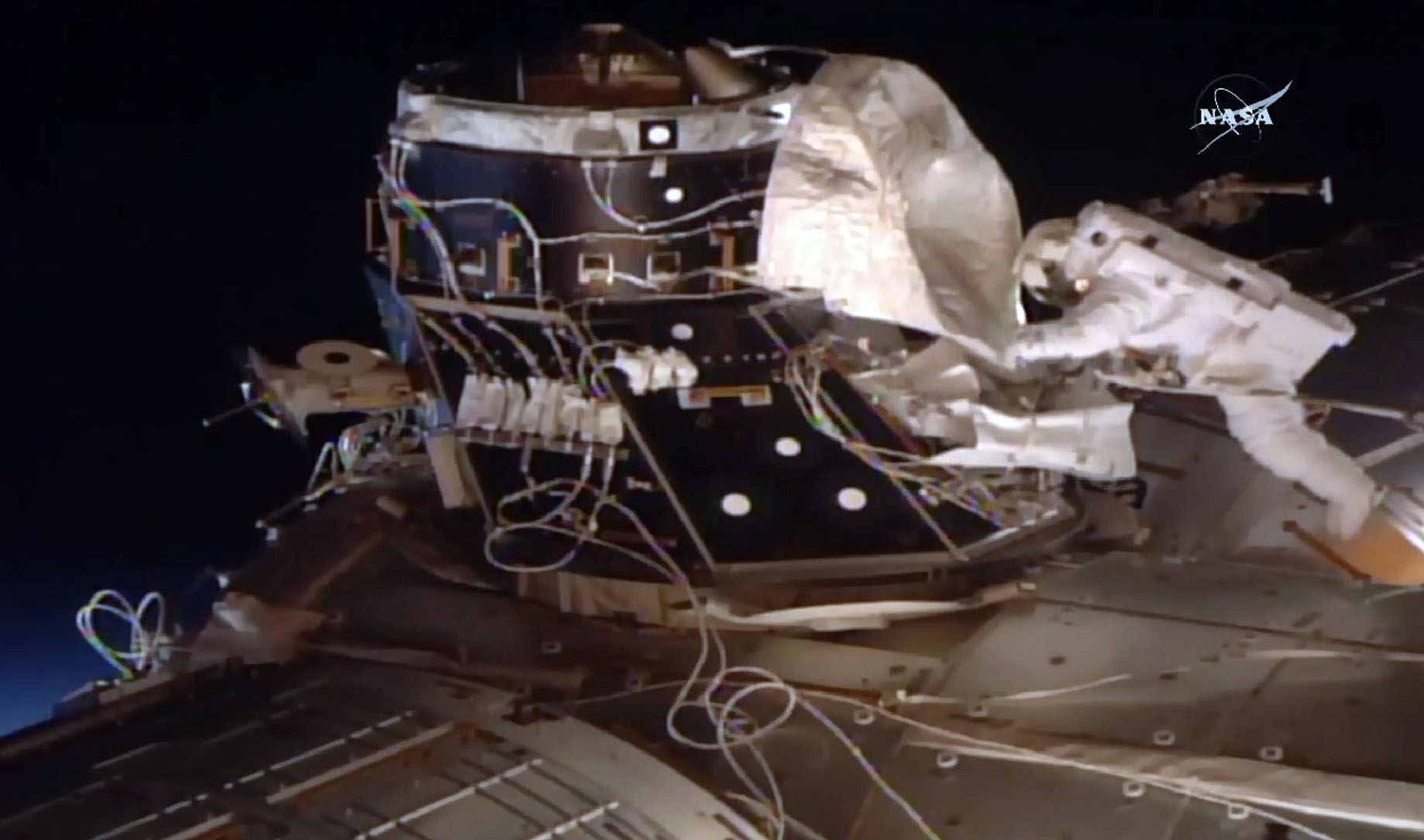 This NASA TV video grab shows US astronaut Peggy Whitson outside the International Space Staion on March 30, 2017. American astronaut Peggy Whitson made history when she floated outside the International Space Station on Thursday, breaking the record for the most spacewalks by a woman. Whitson, 57, is making her eighth career spacewalk, surpassing the record of seven previously held by American Suni Williams.The spacewalk formally began at 7:29 am (1129 GMT) when Whitson and Shane Kimbrough switched their spacesuits to battery power before venturing outside the airlock and into the vacuum of space. / AFP PHOTO / NASA TV / Handout / RESTRICTED TO EDITORIAL USE - MANDATORY CREDIT AFP PHOTO /NASA TV - NO MARKETING - NO ADVERTISING CAMPAIGNS - DISTRIBUTED AS A SERVICE TO CLIENTS