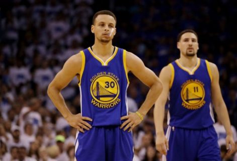 OKLAHOMA CITY, OK - MAY 22: Stephen Curry #30 and Klay Thompson #11 of the Golden State Warriors react in the second quarter against the Oklahoma City Thunder in game three of the Western Conference Finals during the 2016 NBA Playoffs at Chesapeake Energy Arena on May 22, 2016 in Oklahoma City, Oklahoma. NOTE TO USER: User expressly acknowledges and agrees that, by downloading and or using this photograph, User is consenting to the terms and conditions of the Getty Images License Agreement. Ronald Martinez/Getty Images/AFP