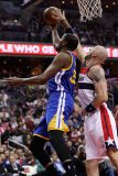 WASHINGTON, DC - FEBRUARY 28: Marcin Gortat #13 of the Washington Wizards blocks a shot by Kevin Durant #35 of the Golden State Warriors in the first half at Verizon Center on February 28, 2017 in Washington, DC. NOTE TO USER: User expressly acknowledges and agrees that, by downloading and or using this photograph, User is consenting to the terms and conditions of the Getty Images License Agreement. Rob Carr/Getty Images/AFP