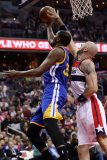 WASHINGTON, DC - FEBRUARY 28: Marcin Gortat #13 of the Washington Wizards blocks a shot by Kevin Durant #35 of the Golden State Warriors in the first half at Verizon Center on February 28, 2017 in Washington, DC. NOTE TO USER: User expressly acknowledges and agrees that, by downloading and or using this photograph, User is consenting to the terms and conditions of the Getty Images License Agreement.   Rob Carr/Getty Images/AFP