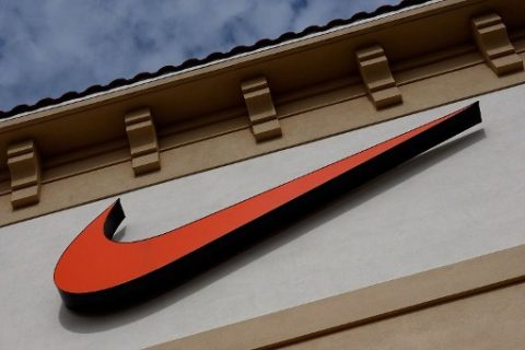 ORLANDO, FL - DECEMBER 12: The "Swoosh" logo is seen on a Nike factory store on December 12, 2009 in Orlando, Florida. Tiger Woods announced that he will take an indefinite break from professional golf to concentrate on repairing family relations after admitting to infidelity in his marriage. The company issued a statement that "Woods and his family have Nike's full support." Getty Images/AFP
