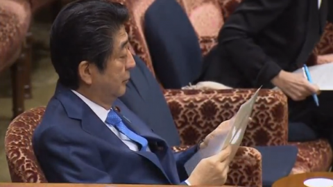 Japanese Prime Minister Shinzo Abe denies allegations of donations made by him or his wife to the principal of a scandal-hit school.(photo grabbed from Reuters video)