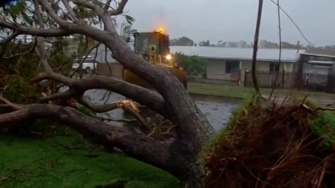 Australia's army and emergency workers headed to areas of tropical Queensland state hardest hit by Cyclone Debbie, finding roads blocked by fallen trees and widespread damage in coastal towns.(photo grabbed from Reuters video)