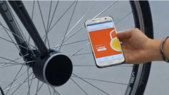 An automated smart bicycle lock detects when the owner has left their bike and locks its front wheel. An alarm is activated and the owner alerted via their smart phone if any would-be thief tries to tamper with it.(photo grabbed from Reuters video)