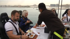 Dinner in the Sky hosts its guests 50 meters above the ground in a unique dining experience.(photo grabbed from Reuters video)