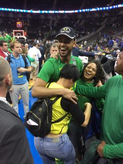 Tyler Dorsey celebrates with his family after Oregon defeats Kansas in the Midwest Regional Final. Dorsey finished with a game-high 27 points.