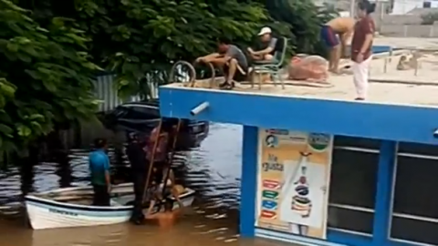 Patients evacuate a flood-ravaged hospital in the stricken Peruvian city of Huarmey and fishermen fear ruin from the devastating El Nino weather phenomena gripping the Andean nation.(photo grabbed from Reuters video)