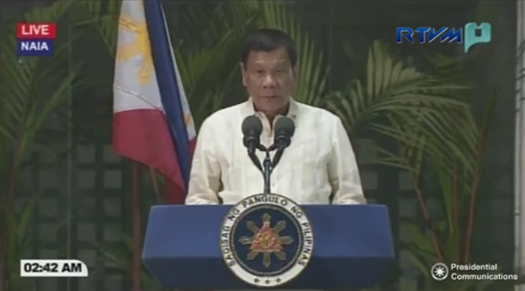 President Rodrigo Duterte reads a speech at the Ninoy Aquino International Airport in Pasay City upon arriving from his official visits in Myanmar and Thailand at around 2:30 a.m. Thursday, March 23, 2017. (Photo grabbed from RTVM video)