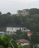 Barton Hotel in Surigao City is seen here atop a hill, and seemed to have leaned a little on the side after successive aftershocks after the 6.7 magnitude quake that earlier rocked Surigao City.  The latest aftershock was measured at magnitude 5.9 and was felt at intensity 6 in Surigao City on Sunday morning, March 5, 2017.  (Eagle News Service)