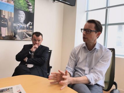 Agence France Presse (AFP) Global Editor-in-Chief Phil Chetwynd gestures while explaining the editorial process in AFP. With him is AFP International Sales Director Francois Bohn. (Eagle News Service)