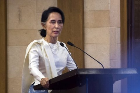 Myanmar's State Counselor Aung San Suu Kyi speaks during a memorial ceremony for murdered lawyer Ko Ni and taxi driver Ne Win in Yangon on February 26, 2017. Myanmar's de facto leader Aung San Suu Kyi on February 26 broke a month long silence on the daylight assassination of her advisor Ko Ni, calling his killing a "great loss" for the country's democracy struggle. / AFP PHOTO / Ye Aung THU
