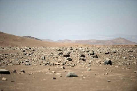 General view of Yungay, Atacama desert, some 80 kilometres south of Antofagasta, Chile on March 7, 2017. Yungay Atacama's desert zone is one of the most arids on the planet, and also one of the most similiar areas to Mars. Scientists believe some ways of life that have developed there could hide the secrets of evolution and survival on other planets, since these microorganisms have adapted to extreme life conditions such as water scarcity, strong solar radiation and almost no presence of nutrients. / AFP PHOTO / Martin BERNETTI