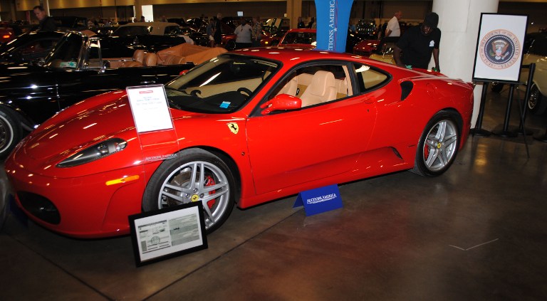 A Ferrari F430 owned by US president Donald J. Trump in 2007 is exhibited by Autcions America in Fort Lauderdale, Florida on March 31, 2017. The auction will take place on April 1, 2017 and is expected to fetch $250,000 to $350,000 US dollars. / AFP PHOTO / Leila MACOR / TO GO WITH AFP STORY BY LEILA MACOR