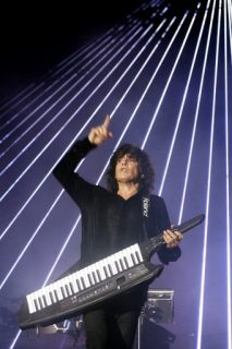 (FILES) This file picture taken on September 18, 2010 shows French composer and music producer Jean-Michel Jarre playing a Roland keyboard during a concert in downtown Beirut. Ikutaro Kakehashi, founder of Japanese electronic musical instrument maker Roland which defined much of the sound of 1980s pop, died on April 1, 2017, aged 87. His keyboards were a staple of synth-pop bands such as Duran Duran, Depeche Mode and Kraftwerk and were popular with electro pioneers Jean-Michel Jarre, Herbie Hancock and The Prodigy. / AFP PHOTO / Anwar AMRO