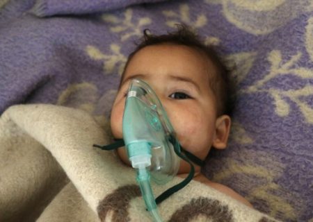 A Syrian child receives treatment at a small hospital in the town of Maaret al-Noman following a suspected toxic gas attack in Khan Sheikhun, a nearby rebel-held town in Syrias northwestern Idlib province, on April 4, 2017. Warplanes carried out a suspected toxic gas attack that killed at least 35 people including several children, a monitoring group said. The Syrian Observatory for Human Rights said those killed in the town of Khan Sheikhun, in Idlib province, had died from the effects of the gas, adding that dozens more suffered respiratory problems and other symptoms. / AFP PHOTO / Mohamed al-Bakour / ADDING INFORMATION IN CAPTION