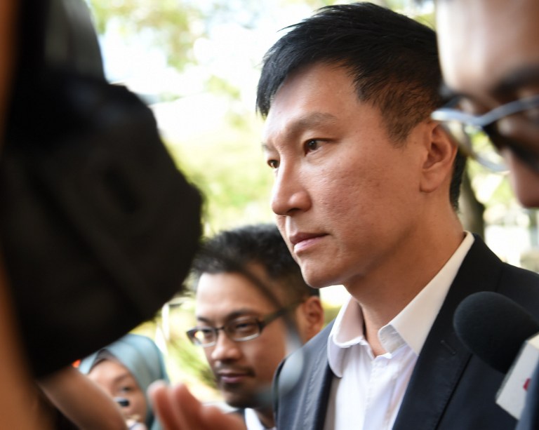 Kong Hee, the senior pastor of the City Harvest Church (CHC) leaves the Supreme court in Singapore on April 7, 2017. The leader of a rich Singapore Christian church was jailed more than three years on April 7 for misusing more than 35 million USD to promote his wife's failed music career. / AFP PHOTO / ROSLAN RAHMAN