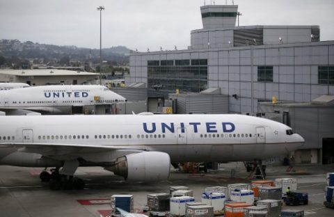 (FILES) This file photo taken on July 07, 2015 shows United Airlines planes on the tarmac at San Francisco International Airport in San Francisco, California. United Airlines found itself in the middle of a social media storm on April 10, 2017, after the US carrier forcefully removed a passenger from a flight due to overbooking. The incident occurred Sunday on a United Express flight bound for Louisville, Kentucky, from Chicago. United Express flights are operated by one of eight regional airlines which partner with United. / AFP PHOTO / GETTY IMAGES NORTH AMERICA / JUSTIN SULLIVAN