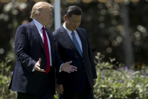 (FILES) This file photo taken on April 7, 2017 shows US President Donald Trump (L) and Chinese President Xi Jinping (R) at the Mar-a-Lago estate in West Palm Beach, Florida. US President Donald Trump said April 11, 2017 that the United States is ready to solve the North Korean "problem" without China if necessary."North Korea is looking for trouble," Trump wrote on Twitter. "If China decides to help, that would be great. If not, we will solve the problem without them! U.S.A." / AFP PHOTO / JIM WATSON