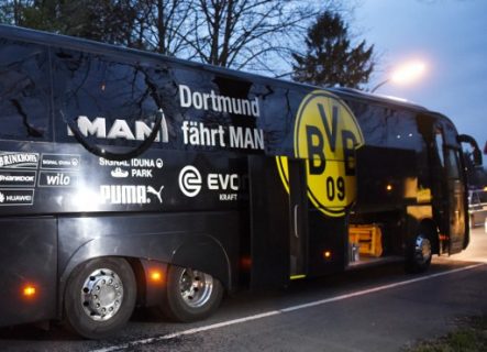 Borussia Dortmund's damaged bus is pictured after an explosion some 10km away from the stadium prior to the UEFA Champions League 1st leg quarter-final football match BVB Borussia Dortmund v Monaco in Dortmund, western Germany on April 11, 2017. / AFP PHOTO / Patrik STOLLARZ