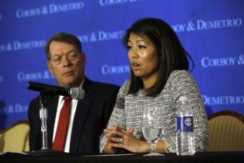 Crystal Dao Pepper (R), daughter of Dr. David Dao, pauses as she speaks about her father as she sits with her attorney Stephen Golan during a news conference on April 13, 2017 in Chicago, Illinois. Attorneys Thomas Demetrio and Golan are representing Dr. Dao after airport police officers physically removed him from his United Airlines seat and dragged him off the airplane at O'Hare International Airport during his flight from Chicago to Louisville, Kentucky, on April 9, 2017. / AFP PHOTO / Joshua LOTT