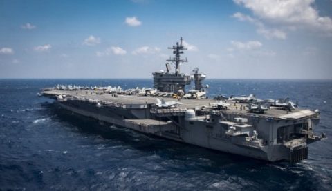 (FILES) This March 2, 2017 file photo shows the aircraft carrier USS Carl Vinson (CVN 70) as transits the South China Sea. The US Navy announced April 15, 2017 it had sent the USS Carl Vinson to the Korean peninsula in a show of force against North Korea's "reckless" nuclear weapons program. "US Pacific Command ordered the Carl Vinson Strike Group north as a prudent measure to maintain readiness and presence in the Western Pacific," said Commander Dave Benham, spokesman at US Pacific Command. / AFP PHOTO / Navy Media Content Operations (NMCO) / MC3 Brenton Poyser / XGTY == RESTRICTED TO EDITORIAL USE / MANDATORY CREDIT: "AFP PHOTO / US NAVY / MC3 Brenton POYSER" / NO MARKETING / NO ADVERTISING CAMPAIGNS / DISTRIBUTED AS A SERVICE TO CLIENTS ==