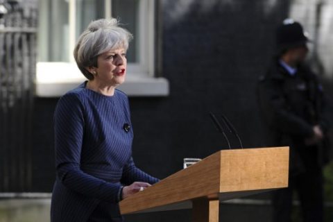 British Prime Minister Theresa May speaks to the media outside 10 Downing Street in central London on April 18, 2017. British Prime Minister Theresa May called today for an early general election on June 8 in a surprise announcement as Britain prepares for delicate negotiations on leaving the European Union. / AFP PHOTO / DANIEL SORABJI