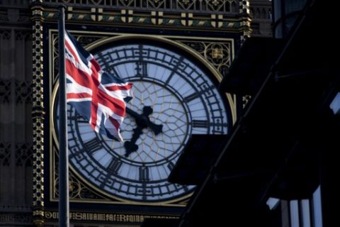 A Union flag flies in the wind in front of the clock face of Elizabeth Tower, commonly referred to as Big Ben, near the Houses of Parliament in Westminster, central London on April 18, 2017. British Prime Minister Theresa May called Tuesday for a snap election on June 8, in a shock move as she seeks to bolster her position before tough talks on leaving the EU. May is apparently aiming to cash in on her 20-point lead over the main opposition Labour party to increase her majority and give her a stronger hand in the Brexit battles with Brussels ahead. / AFP PHOTO / Justin TALLIS