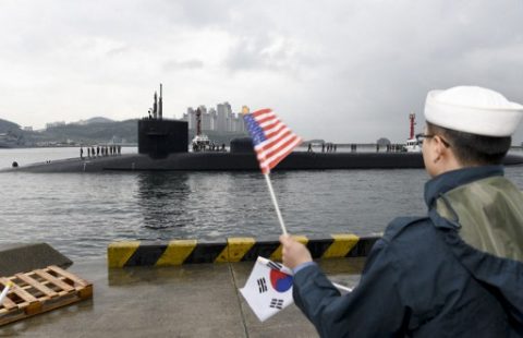 In this image released by the US Navy shows the Ohio-class guided-missile submarine USS Michigan being greeted on April 25, 2017 as it arrives in Busan, South Korea, for a scheduled port visit while conducting routine patrols throughout the western Pacific. The Michigan made a port call at Busan, while US navy destroyers carried out separate joint exercises with Japanese and South Korean vessels. According to the US Navy's Submarine Force Pacific website, the Michigan carries more than 150 Tomahawk cruise missiles. / AFP PHOTO / US NAVY / Jermaine RALLIFORD / RESTRICTED TO EDITORIAL USE - MANDATORY CREDIT "AFP PHOTO / US NAVY / Mass Communication Specialist 2nd Class Jermaine Ralliford" - NO MARKETING NO ADVERTISING CAMPAIGNS - DISTRIBUTED AS A SERVICE TO CLIENTS