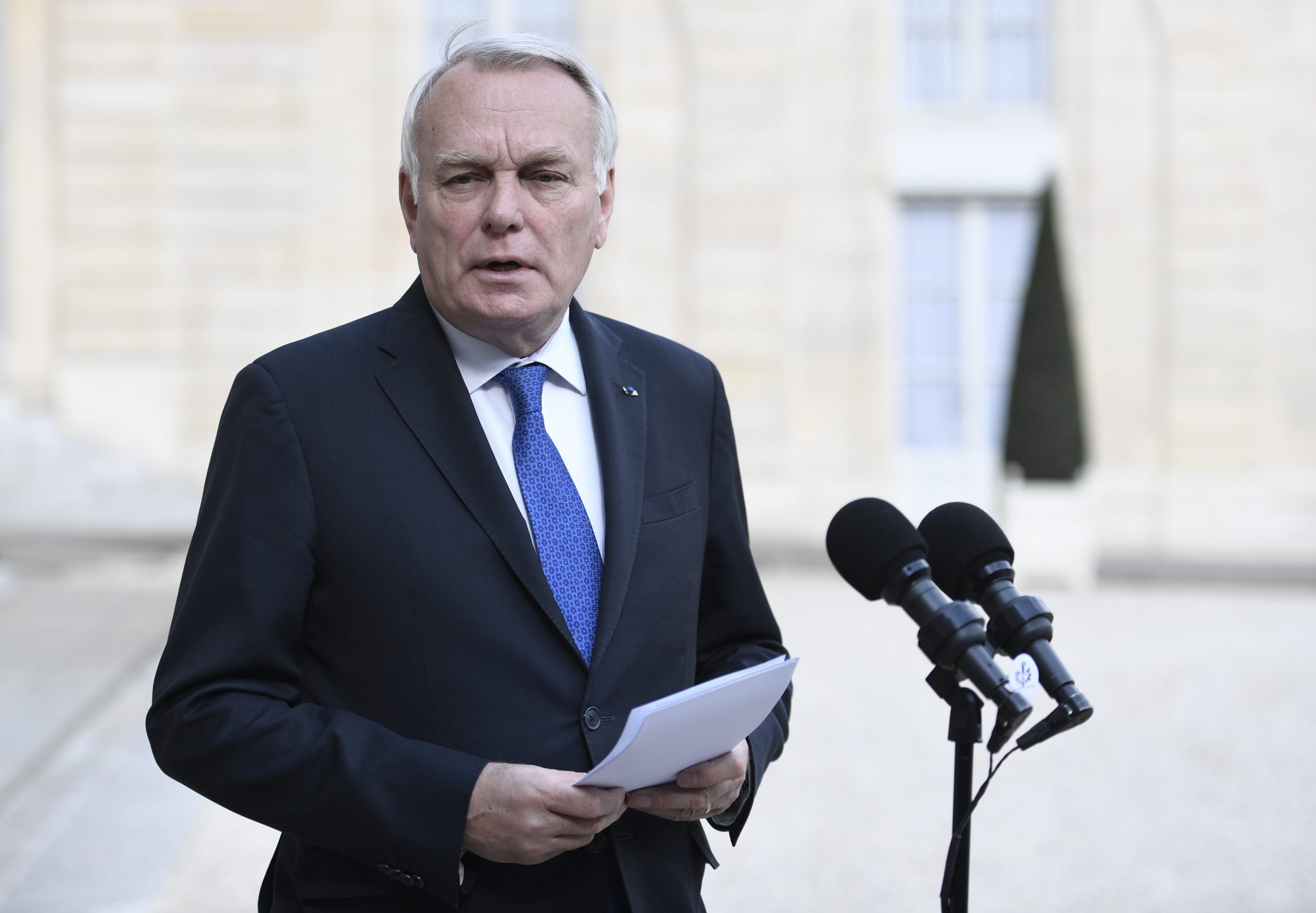French Foreign Minister Jean-Marc Ayrault gives a statement to the media following a Defence Cabinet meeting on April 26, 2017 at the Elysee Palace in Paris. A report by French intelligence services blames the Syrian President's regime for a suspected chemical attack in rebel-held Syria that killed 87 people, Foreign Minister Jean-Marc Ayrault said Wednesday. / AFP PHOTO / STEPHANE DE SAKUTIN