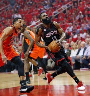 HOUSTON, TX - APRIL 16: James Harden #13 of the Houston Rockets drives past Andre Roberson #21 of the Oklahoma City Thunder for a layup during the first quarter during Game One of the first round of the Western Conference 2017 NBA Playoffs at Toyota Center on April 16, 2017 in Houston, Texas. NOTE TO USER: User expressly acknowledges and agrees that, by downloading and/or using this photograph, user is consenting to the terms and conditions of the Getty Images License Agreement.   Bob Levey/Getty Images/AFP