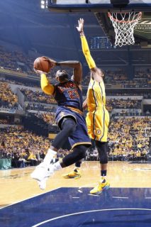 INDIANAPOLIS, IN - APRIL 20: LeBron James #23 of the Cleveland Cavaliers goes to the basket against Paul George #13 of the Indiana Pacers in the second quarter of Game Five of the Eastern Conference First Round during the 2017 NHL Stanley Cup Playoffs at Bankers Life Fieldhouse on April 20, 2017 in Indianapolis, Indiana. The Cavaliers defeated the Pacers 119-114 to take a 3-0 lead in the series. NOTE TO USER: User expressly acknowledges and agrees that, by downloading and or using the photograph, User is consenting to the terms and conditions of the Getty Images License Agreement. Joe Robbins/Getty Images/AFP