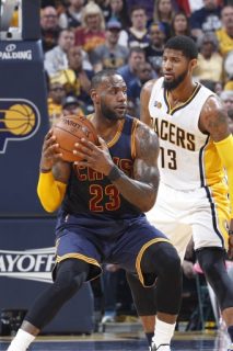 INDIANAPOLIS, IN - APRIL 23: LeBron James #23 of the Cleveland Cavaliers handles the ball against Paul George #13 of the Indiana Pacers in the first half of Game Four of the Eastern Conference Quarterfinals during the 2017 NBA Playoffs against at Bankers Life Fieldhouse on April 23, 2017 in Indianapolis, Indiana. NOTE TO USER: User expressly acknowledges and agrees that, by downloading and or using the photograph, User is consenting to the terms and conditions of the Getty Images License Agreement. Joe Robbins/Getty Images/AFP