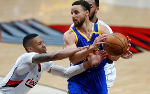 PORTLAND, OR - APRIL 24: Stephen Curry #30 of the Golden State Warriors is guarded by Damian Lillard #0 of the Portland Trail Blazers during Game Four of the Western Conference Quarterfinals of the 2017 NBA Playoffs at Moda Center on April 24, 2017 in Portland, Oregon. NOTE TO USER: User expressly acknowledges and agrees that, by downloading and or using this photograph, User is consenting to the terms and conditions of the Getty Images License Agreement. Jonathan Ferrey/Getty Images/AFP