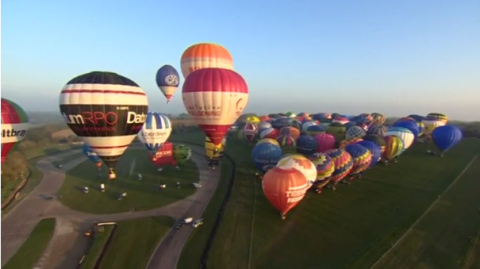 Dozens of hot air balloons cross English Channel from Dover to France in world record bid.(photo grabbed from Reuters video)