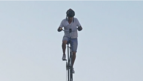 An attempt by a Cuban cyclist seeking to break the world record for the tallest bike ride fails to get off the ground after he is pulled over by police.(photo grabbed from Reuters video)