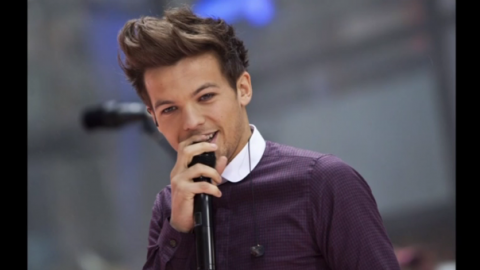 One Direction's Louis Tomlinson is not expected to be charged after getting into a scuffle with a photographer at LAX airport, judicial officials said on Tuesday (April 11).(photo grabbed from Reuters video)