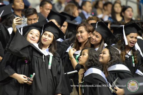 Happy time to take a selfie/groupie.  An NEU graduate takes a selfie with her friends at the Philippine Arena during the NEU's 42nd commencement exercises on Tuesday, April 18, 2017.  (Photo courtesy NEU official facebook page)