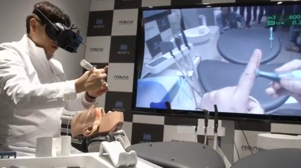 Dental surgeons in Japan train for their craft using mixed reality (MR) simulation program. (Photo grabbed from Reuters video)