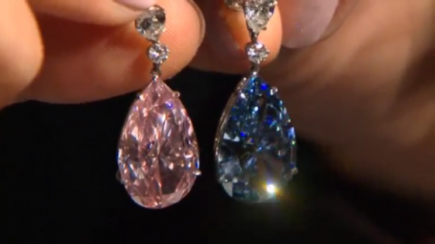 Sparkling diamond earrings - 'The Apollo and Artemis Diamonds' - seen fetching up to $70 mln at auction - on display in London(photo grabbed from Reuters video)