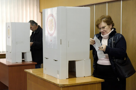 Armenians cast their votes in legislative polls. AFP/ Karen Menesyan