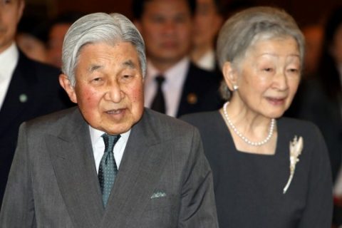 Japan's Emperor Akihito and Empress Michiko arrive for a meeting with family members of Japanese veterans living in Vietnam at a hotel in Hanoi on March 2, 2017. The 83-year-old Akihito and his wife, Michiko, are on their first visit to the country, the latest in a series of trips to former battlegrounds. / AFP PHOTO / POOL / MINH HOANG