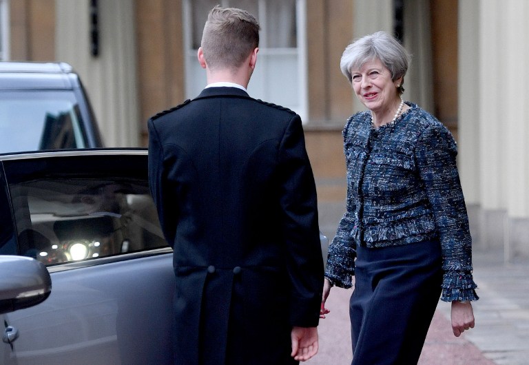 Britain's Prime Minister Theresa May leaves Buckingham Palace after an audience with Queen Elizabeth II to mark the dissolution of Parliament in London on May 3, 2017 British Prime Minister Theresa May visited Queen Elizabeth II on Wednesday to mark the dissolution of parliament ahead of next month's surprise election. May called the June 8 vote last month, saying she wanted an increased mandate to take Britain into negotiations on leaving the European Union. / AFP PHOTO / POOL / Victoria Jones